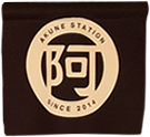 Akune Station logo
